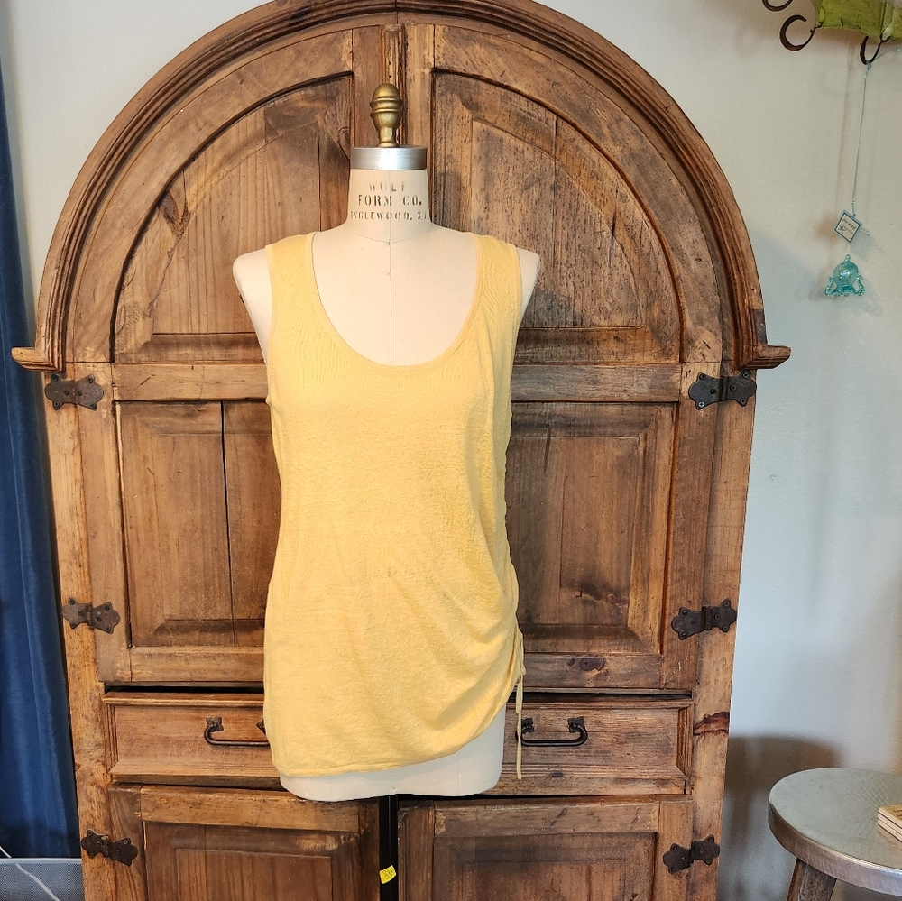 Calvin Klein linen sleeveless top. Pale yellow with roushed detail on one side.
